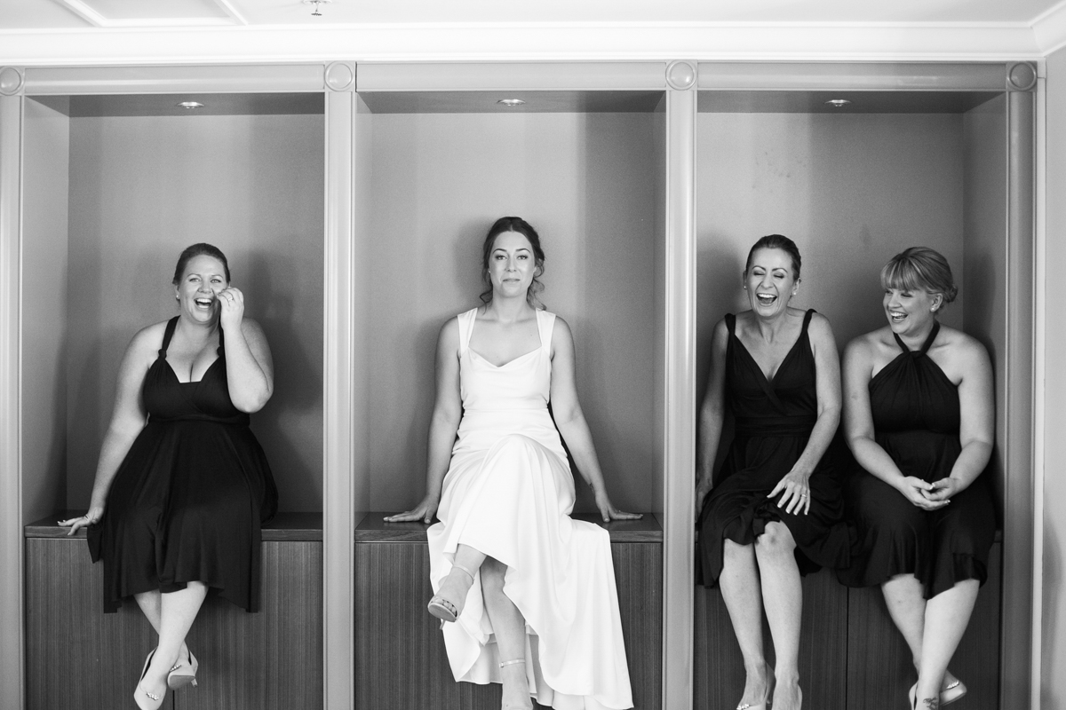 05_happy bridesmaids at crowne plaza newcastle captured by relaxed wedding photographer