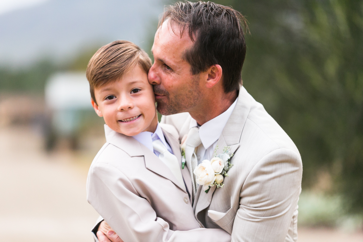 20_groom with paige boy at margan wines hunter valley wedding photographer